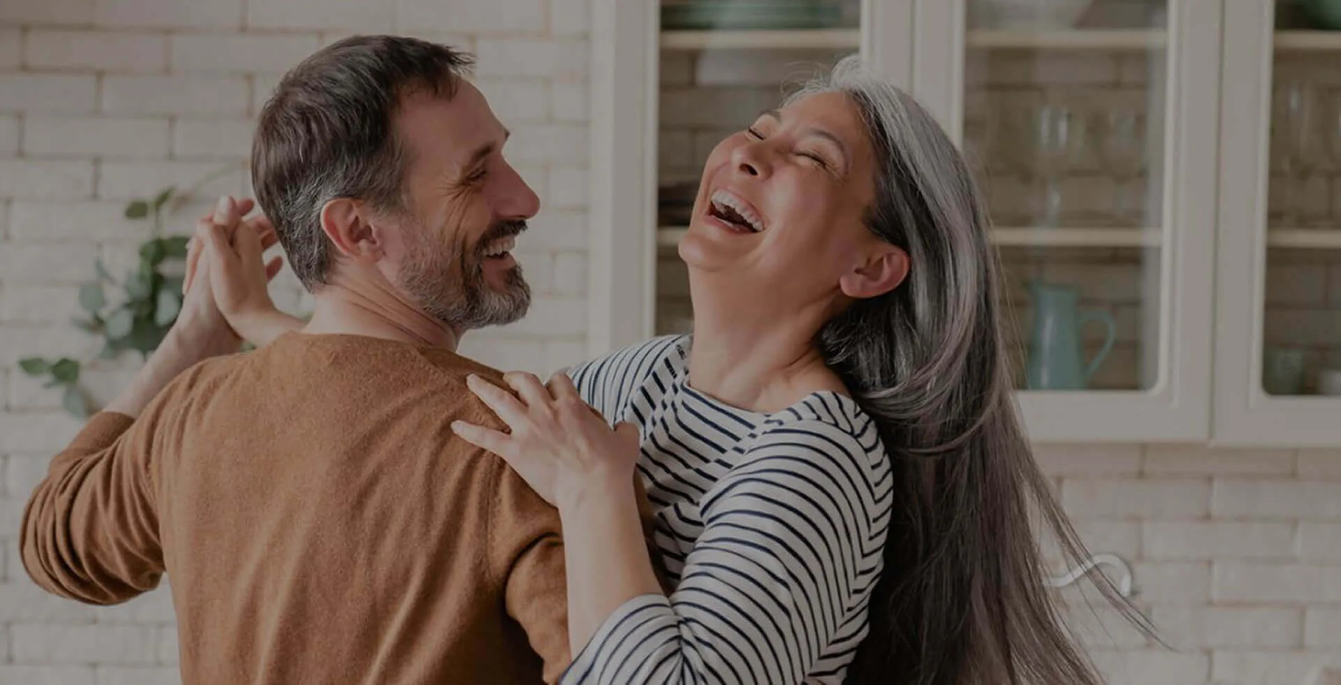 A couple sharing a warm, joyful moment